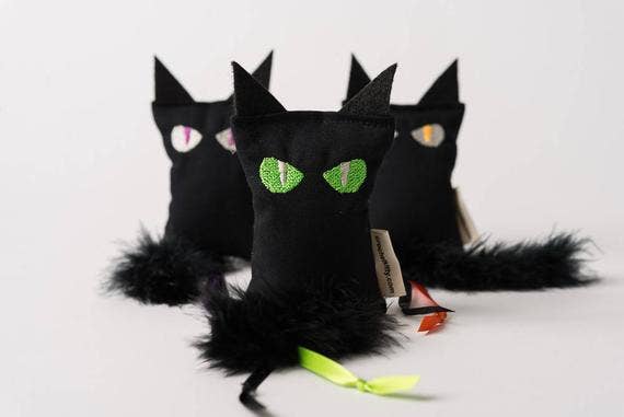 Black cat shaped catnip toy with embroidered eyes and feather | Chloe Cole Pet Couture
