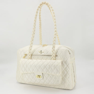 Cream Luxury Pet Carrier | The Porsha dog carrier is the perfect carrier for you and your baby! This luxury carrier includes meshing on both sides, YKK zippers, and plenty of storage space in the front pocket for all your necessities and accessories. Travel in style with our luxury carrier! | Chloe Cole Pet Couture |  Large- 17.5" x 7" x 10" | Holds dogs up to 8 Lbs